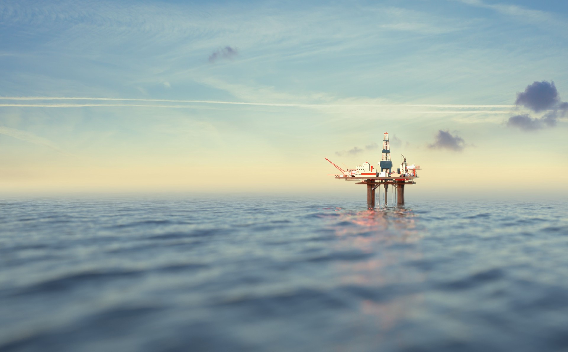 Offshore oil rig,  drilling rig, jack up rig, oil platform at the sea during sunset  3D rendering illustration