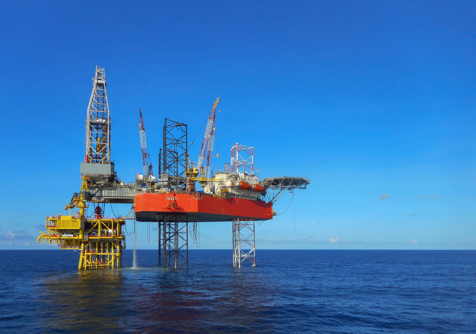 Offshore drilling rig high resolution blue sky background